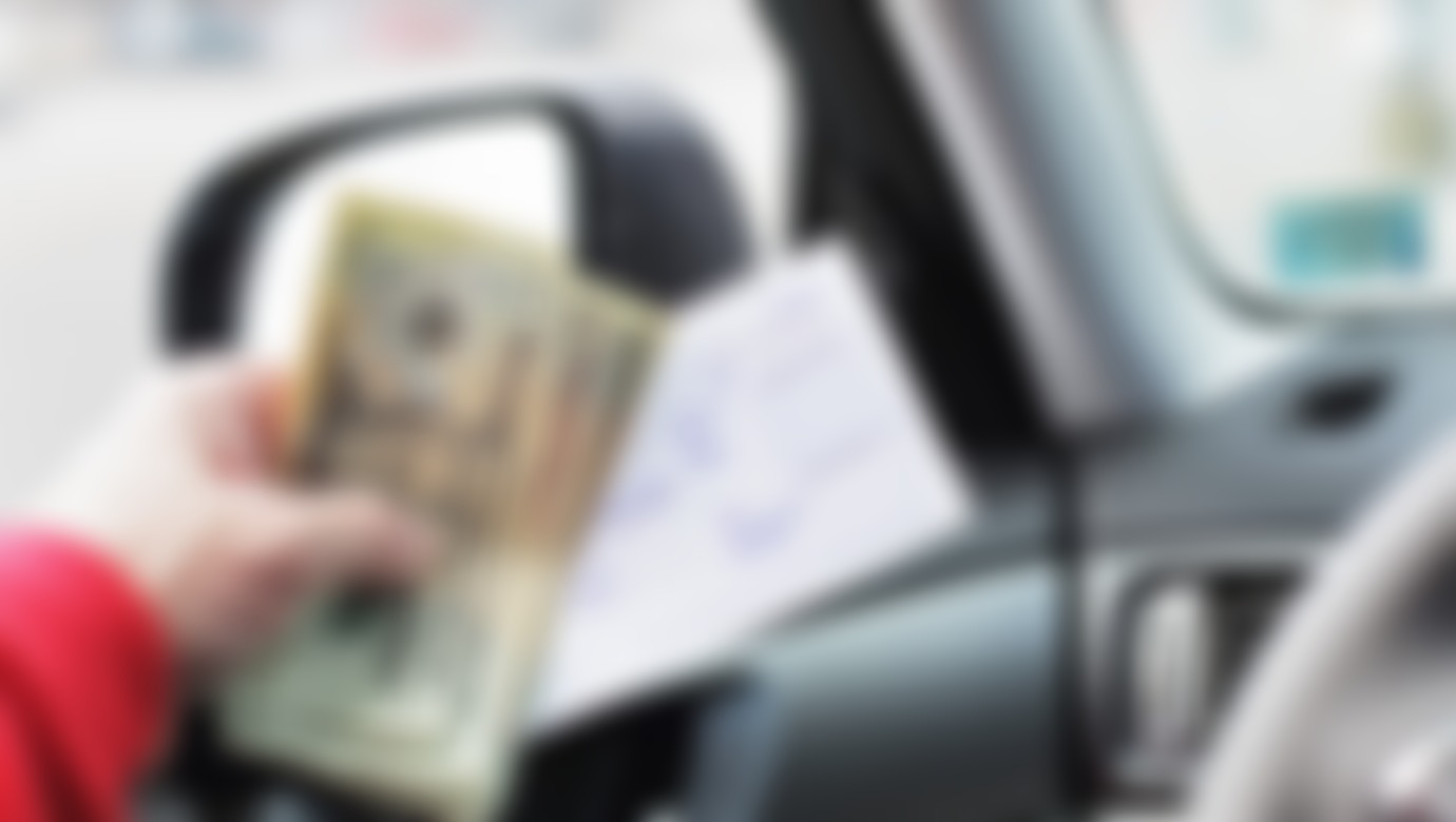 A thumbnail showcasing someone holding cash and a deposit slip while sitting in a car.