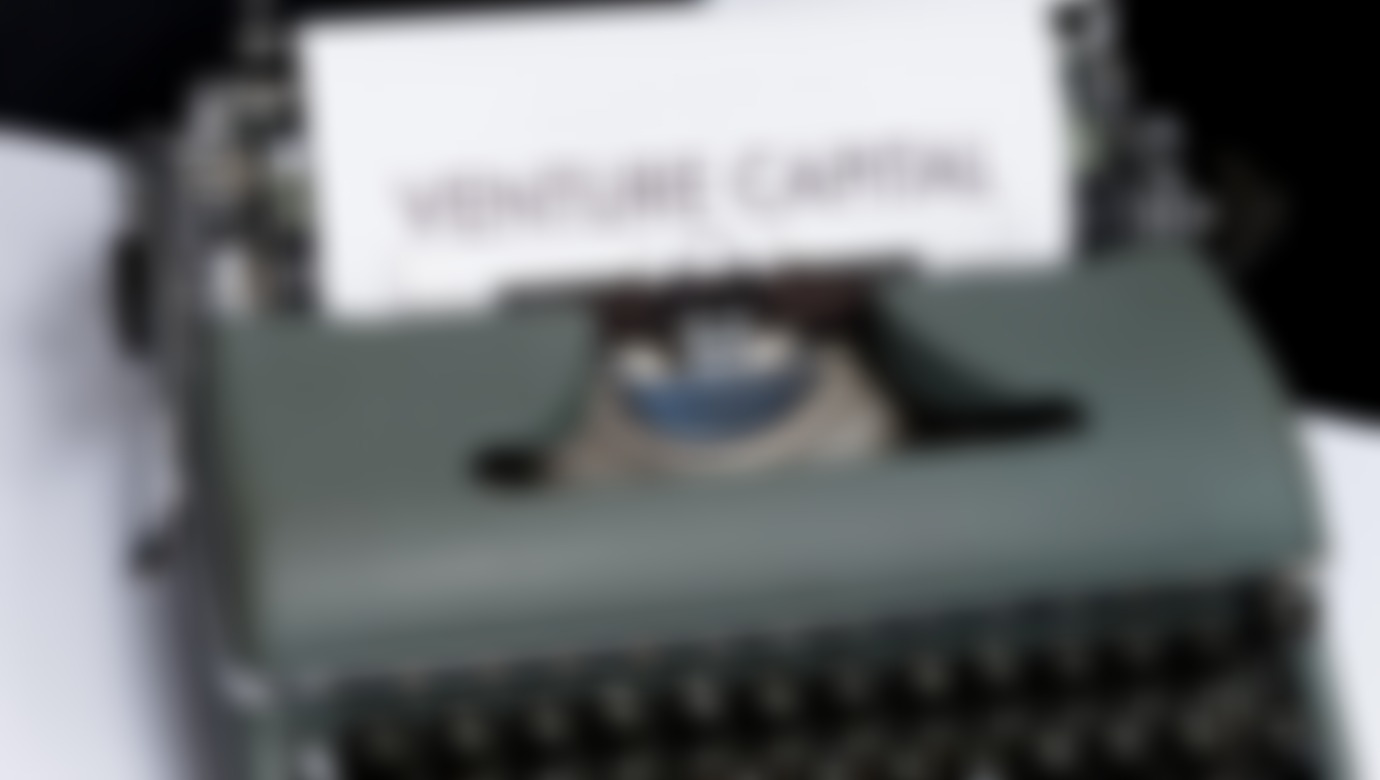 A thumbnail showcasing a typewriter with the words venture capital written on the paper.
